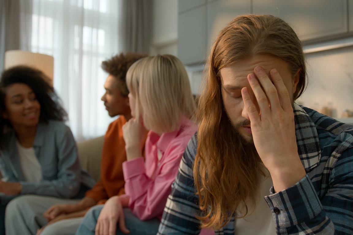 man with social anxiety at an event.