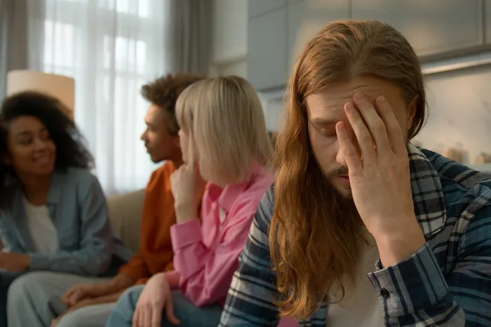 man with social anxiety at an event.