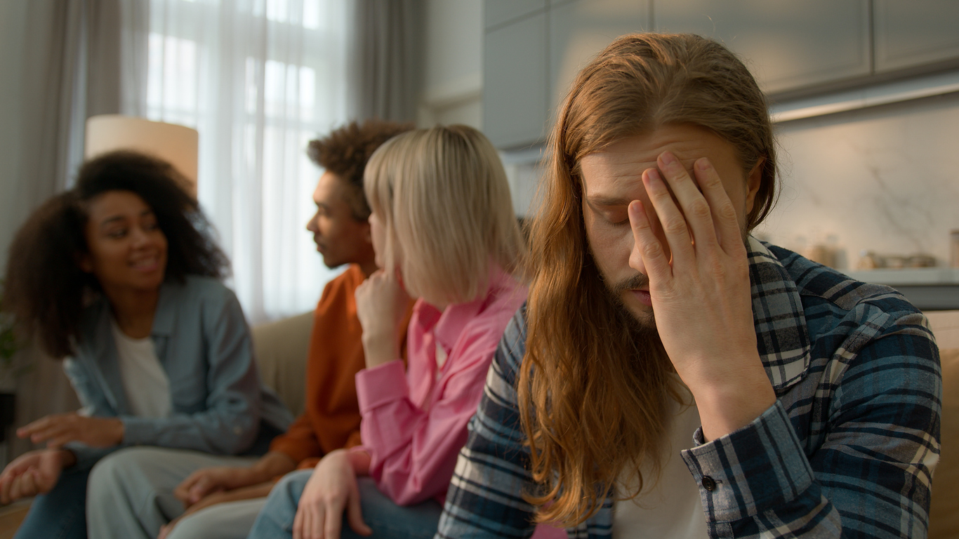 man with social anxiety at an event.